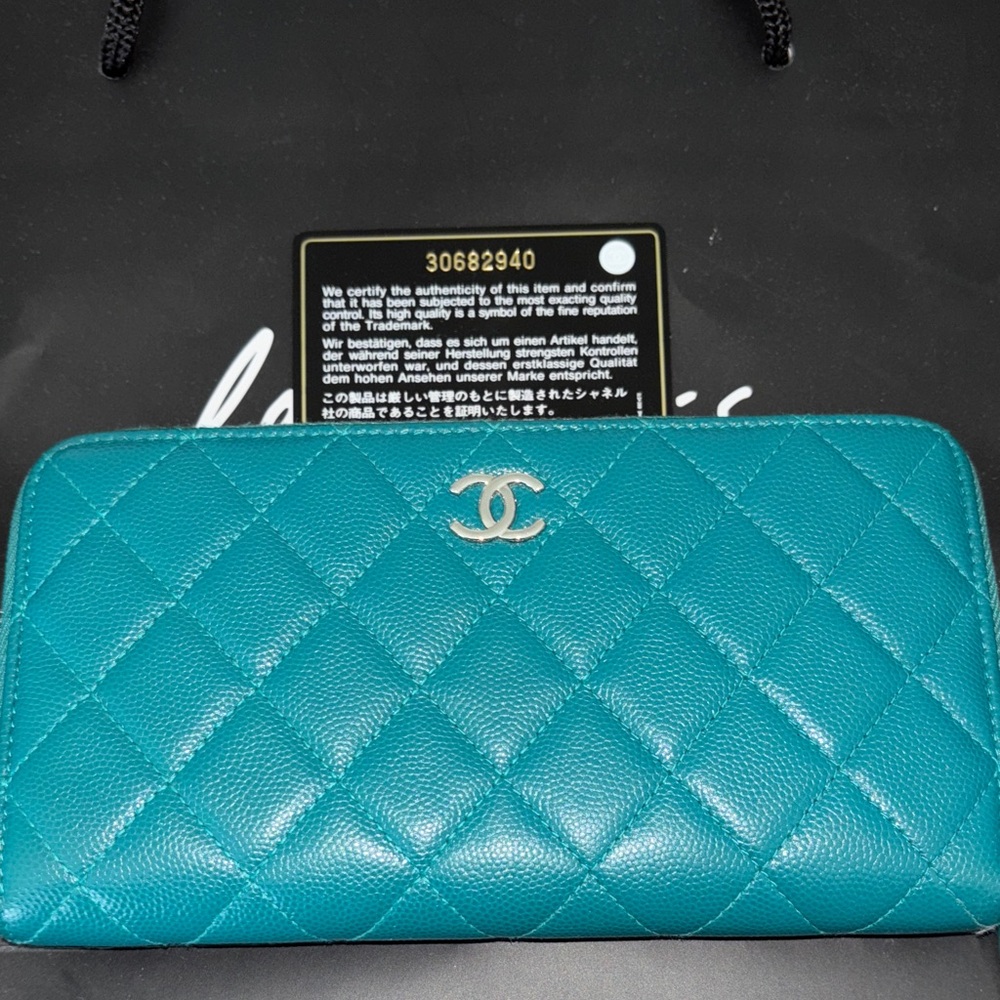 CHANEL Turquoise Quilted Wallet with Silver Logo